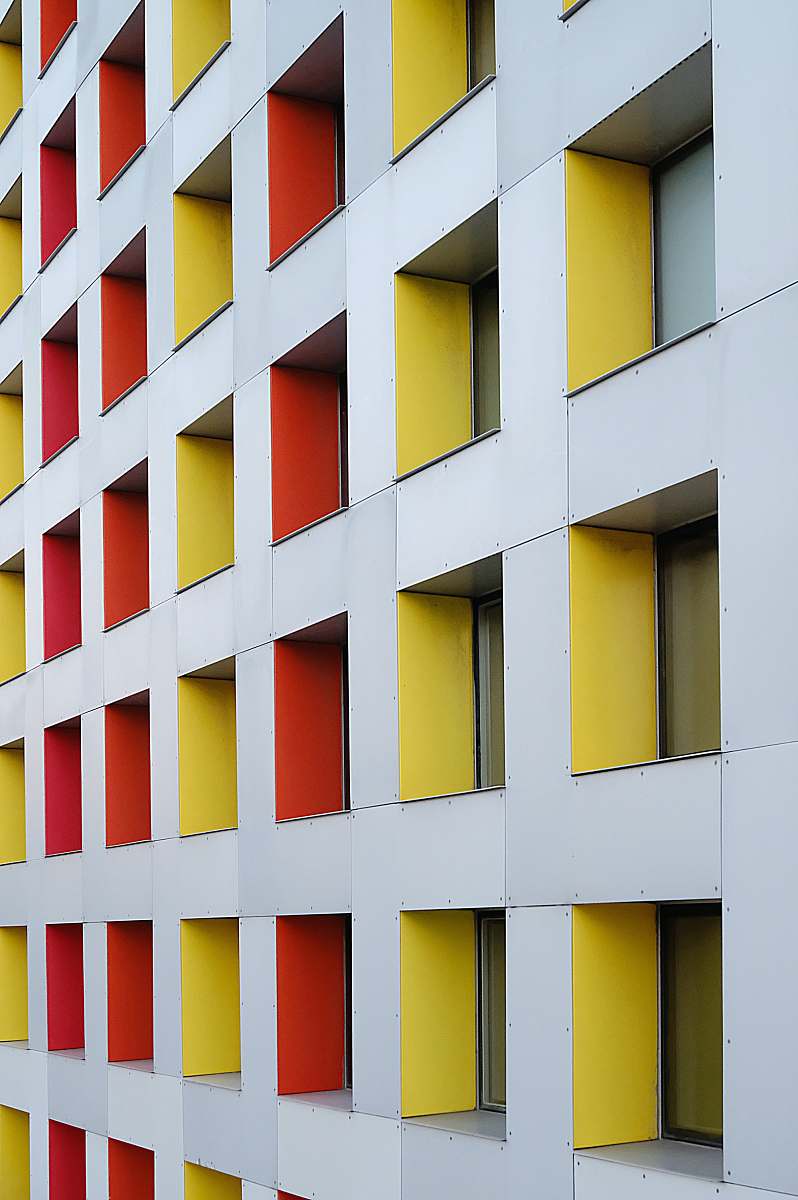 office building white, yellow, and red concrete multi-storey building boston
